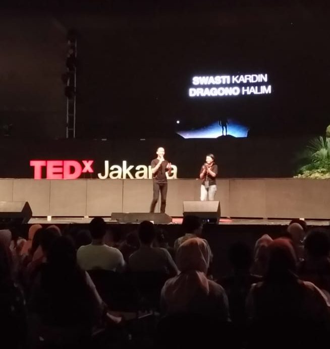 2 hosts on TEDxJakarta 2018 stage. Road to ego feeding?